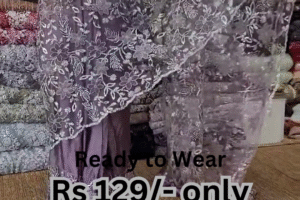 Elegant Purple Net Saree with Intricate Design