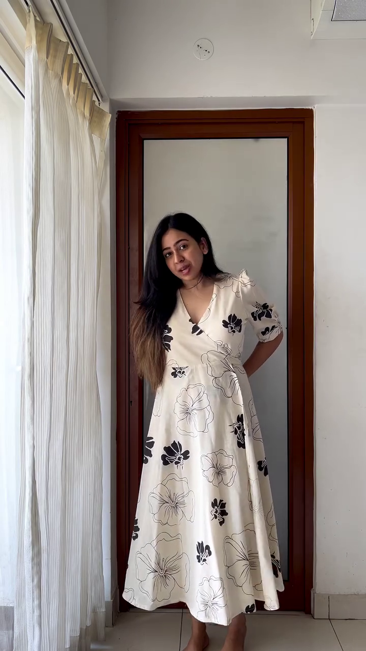 Elegant Floral Wrap Dress in Cream with Black Floral Prints - Image 4