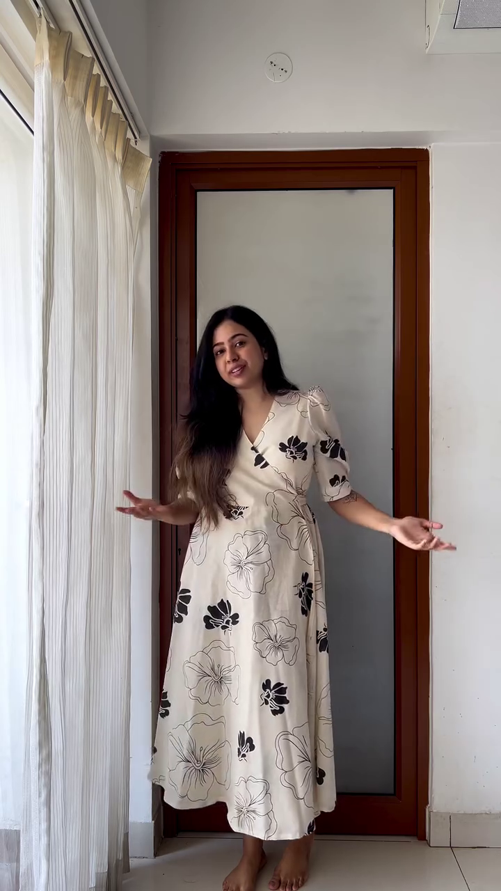 Elegant Floral Wrap Dress in Cream with Black Floral Prints - Image 3