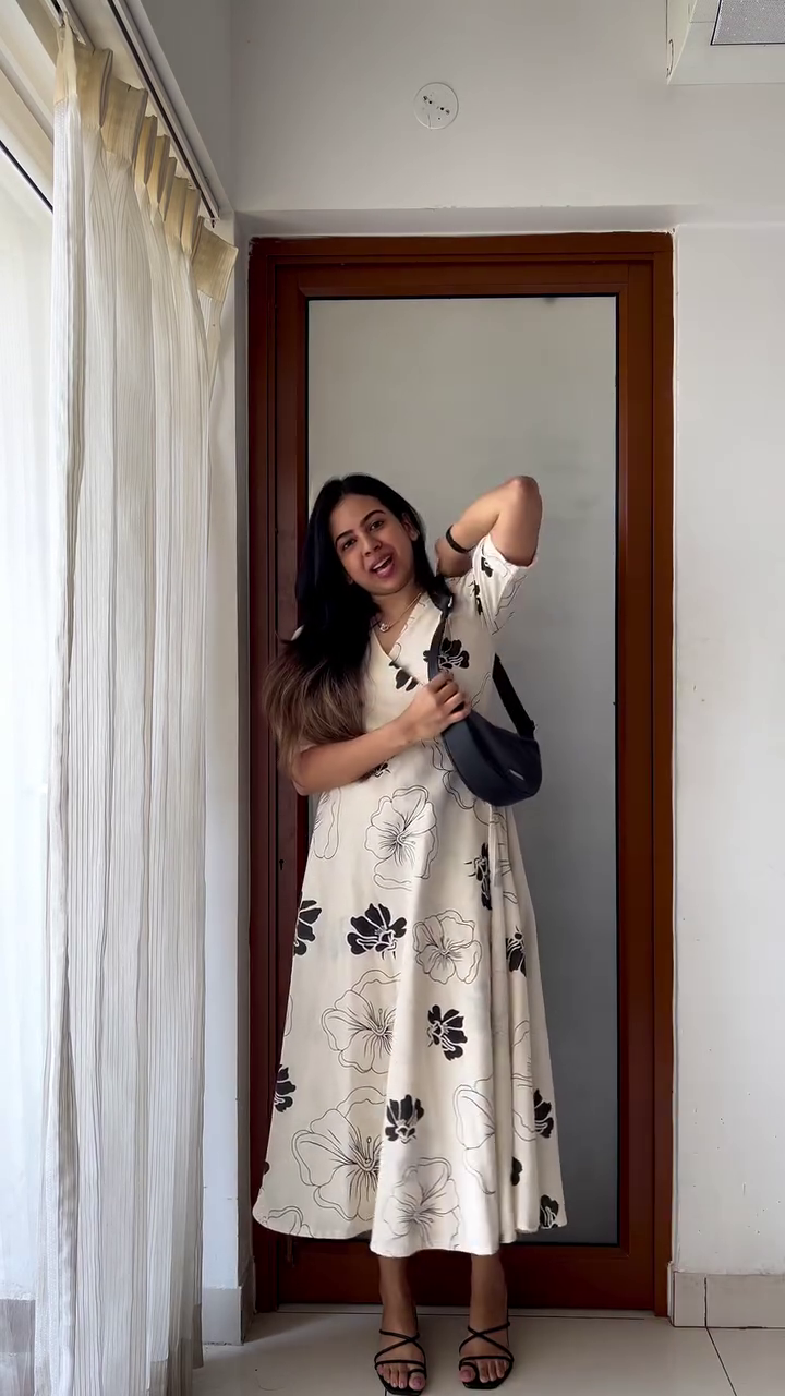 Elegant Floral Wrap Dress in Cream with Black Floral Prints - Image 2