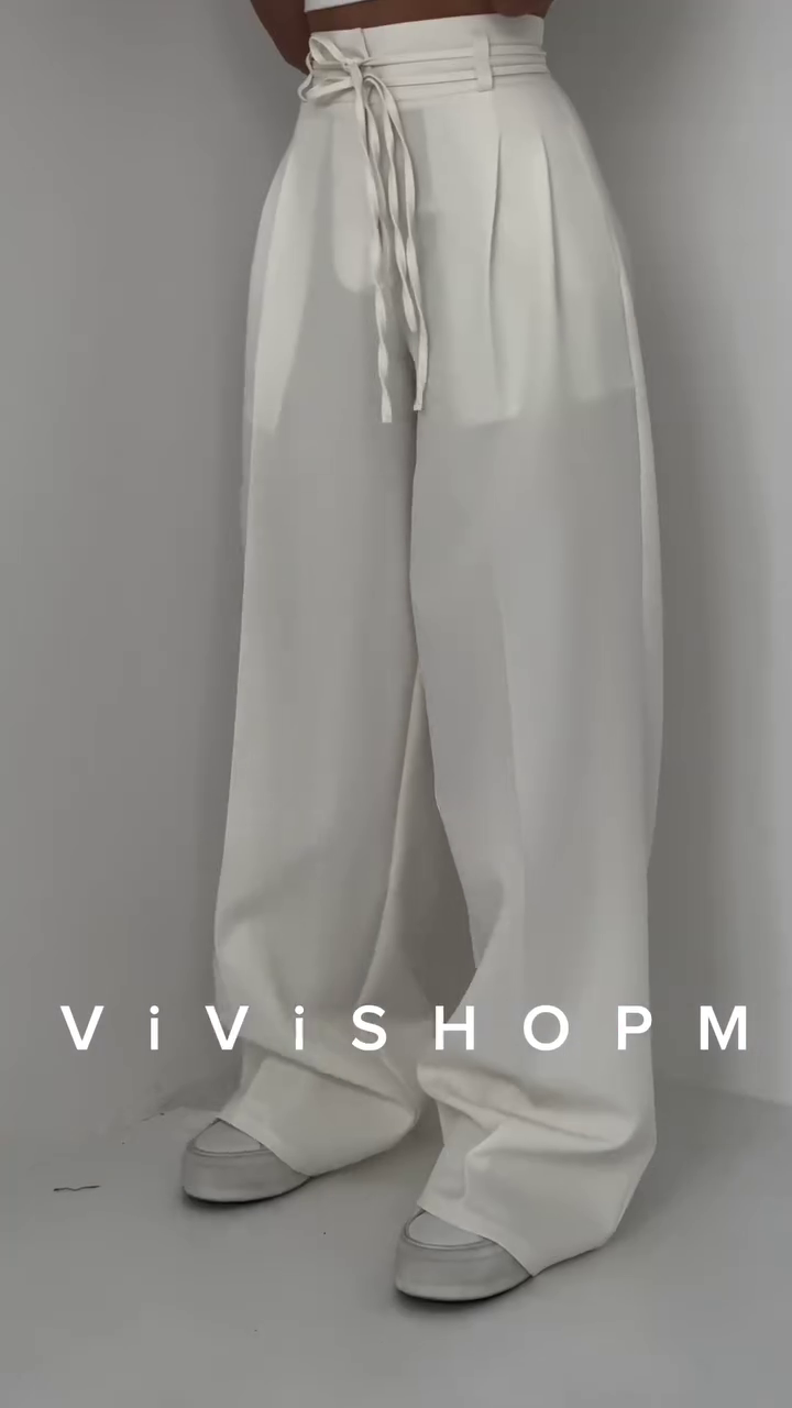 High-Waist Stone Beige Tailored Palazzo Pants with Waist-Cinch Belt Detailing – Elegant Pleated Wide-Leg Trousers for Modern Minimalist Fashion - Image 8
