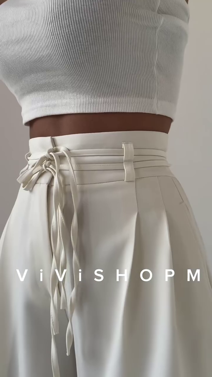 High-Waist Stone Beige Tailored Palazzo Pants with Waist-Cinch Belt Detailing – Elegant Pleated Wide-Leg Trousers for Modern Minimalist Fashion