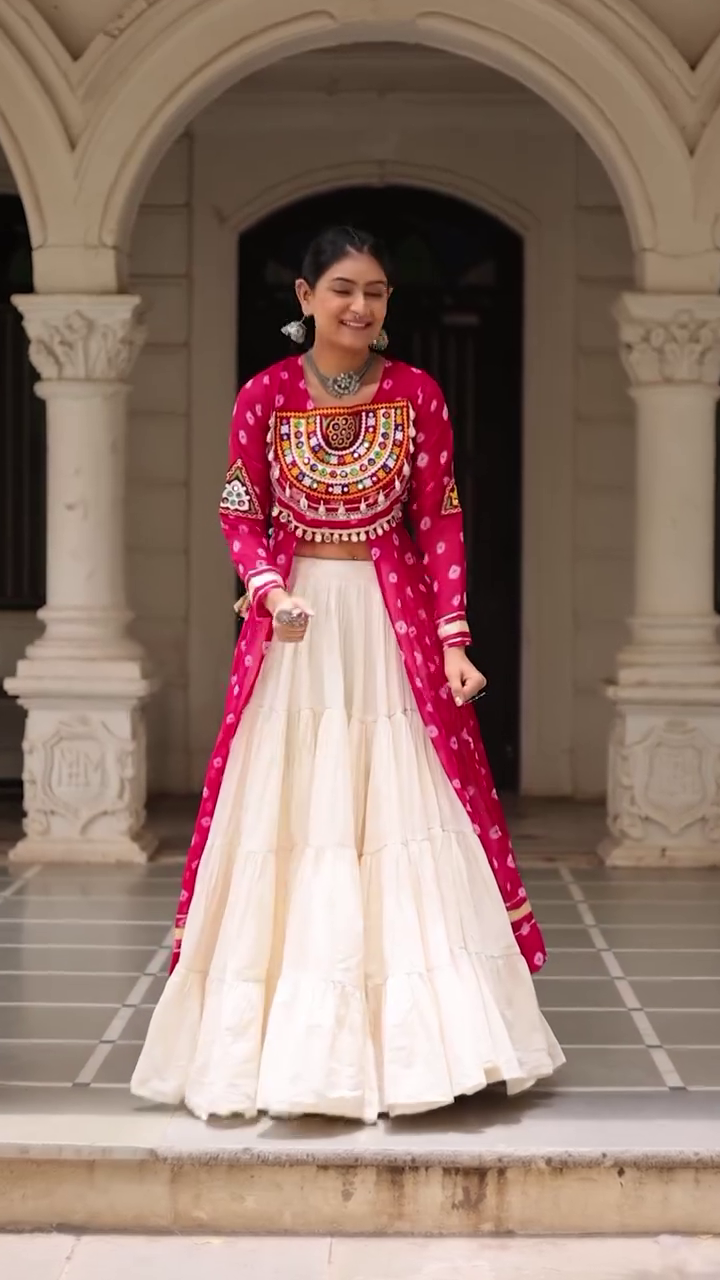 Traditional Kutchi Mirror Work Embroidered Pink Long Jacket with White Flared Lehenga – Navratri & Festive Special Ethnic Wear Set for Women