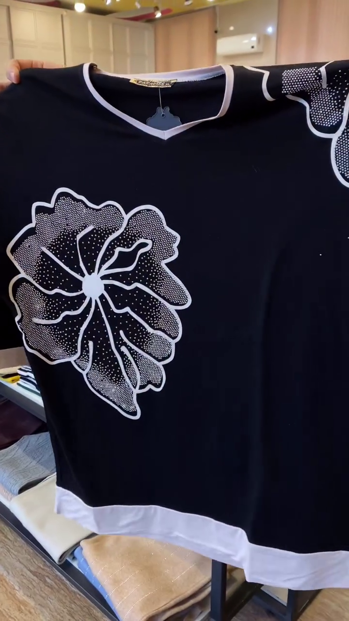 Chic & Effortless – Women’s Black T-Shirt with White Floral Print