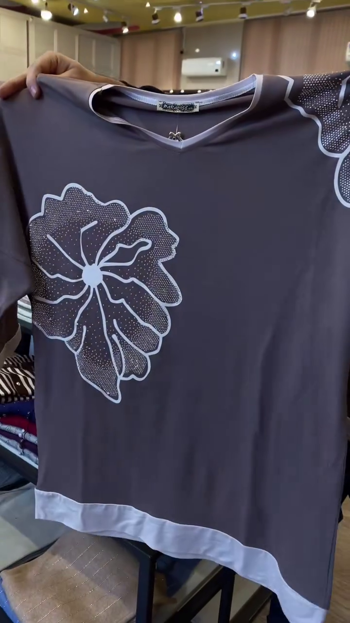 Chic & Effortless – Women’s Black T-Shirt with White Floral Print - Image 2