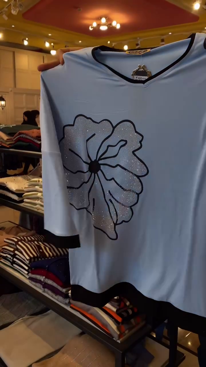 Chic & Effortless – Women’s Black T-Shirt with White Floral Print - Image 4