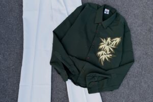 🌿 Effortless Chic: Dark Green Embroidered Shirt with Classic White Trousers 🌿