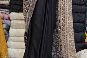 Midnight Glamour: Black Designer Saree with Intricate Embroidery and Sheer Sequin Drape