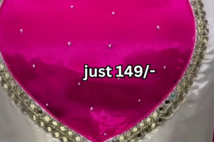 Festive Glam: Bold Pink Elegance with Traditional Detailing