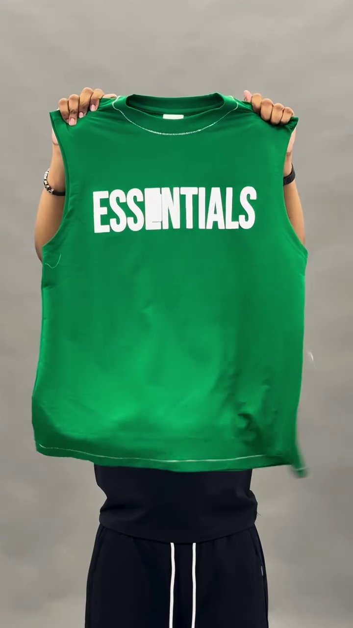 ⚪ ESSENTIALS Sleeveless Tee – Minimal Style, Maximum Impact