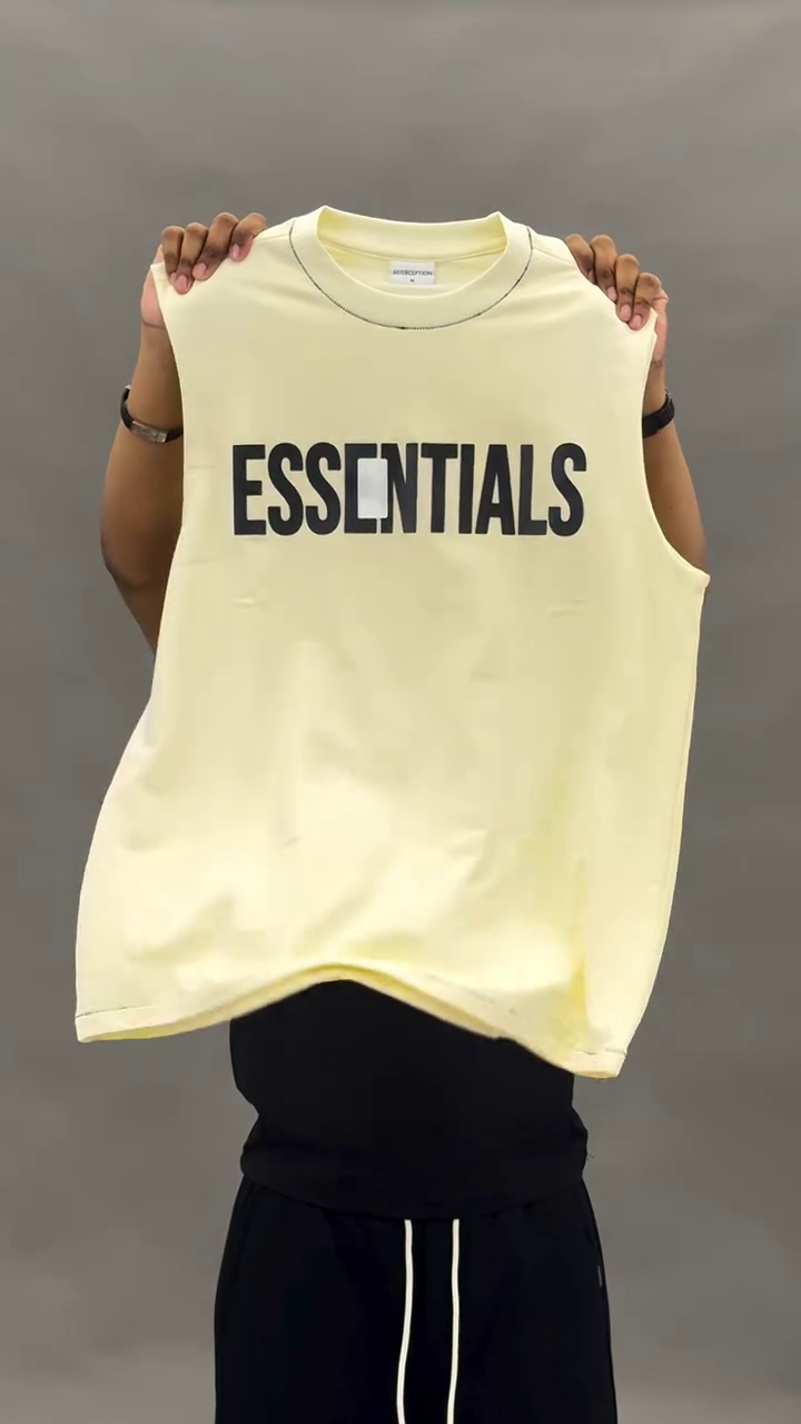 ⚪ ESSENTIALS Sleeveless Tee – Minimal Style, Maximum Impact - Image 3